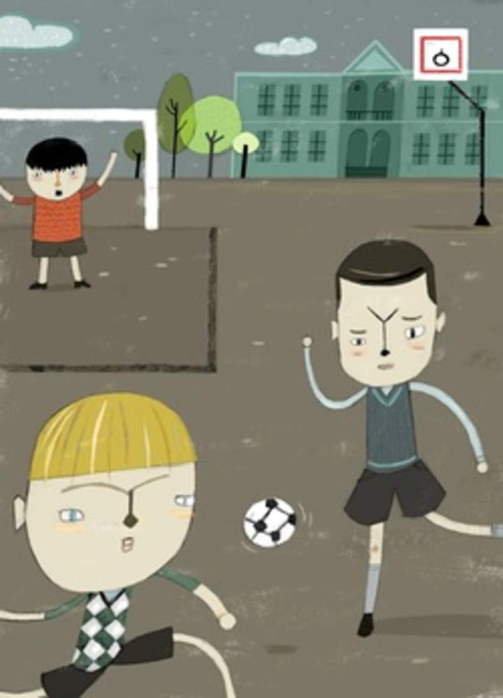 Niños jugando fútbol