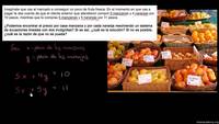 Usando un sistema de ecuación para encontrar el precio de las manzanas y de las naranjas